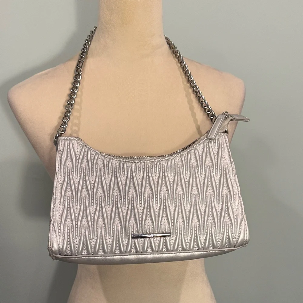 Aldo quilted silver Shoulder Bag with silver chain.